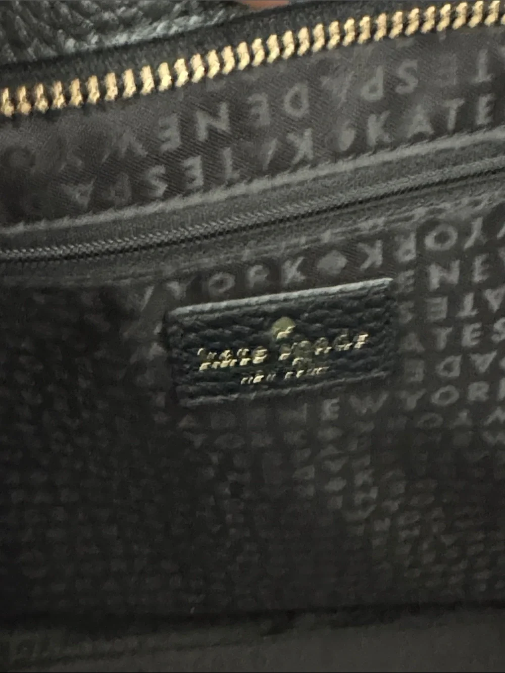 kate spade Black Pebbled Leather Tote with Front Zip Tassel